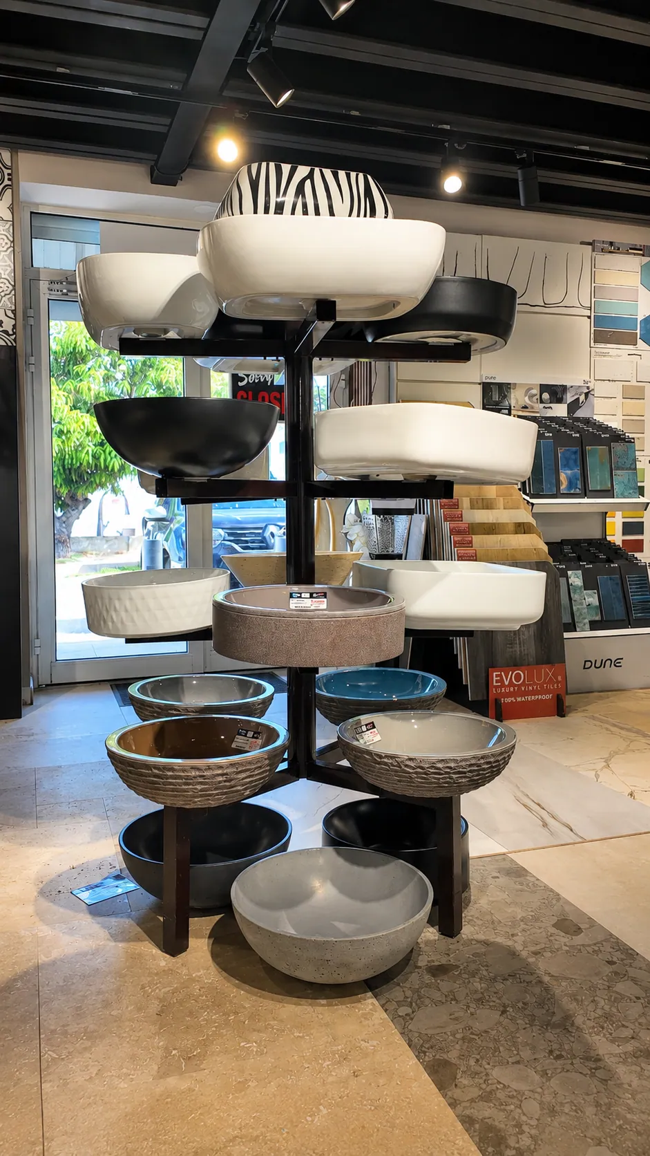 Designer basin display tower